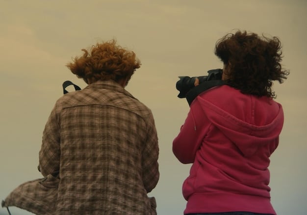 A still from an emerging Brazilian filmmaker's film, showing a poignant scene with two characters in a rural setting, bathed in soft natural light. The image evokes a sense of longing and introspection.