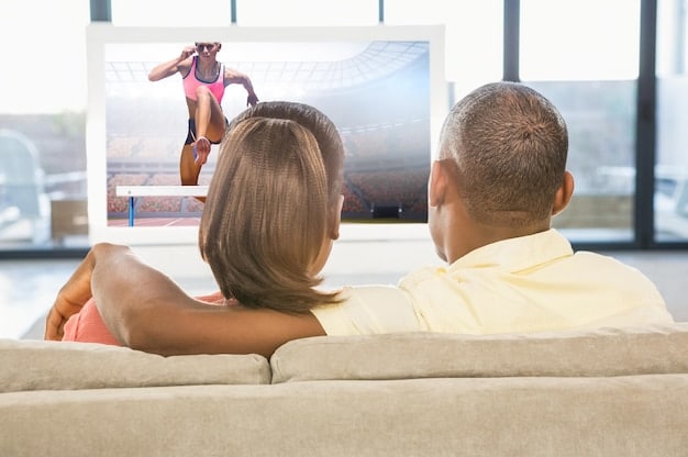 A family in a living room in Brazil, smiling and watching a high-definition movie on a large smart TV, with a subtle 5G signal icon in the corner of the screen implying seamless streaming.