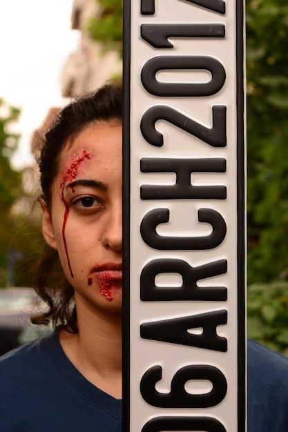 A promotional image of a Brazilian horror film poster showcased at an international film festival, with diverse attendees in the background admiring the artwork and the festival logo subtle but visible.