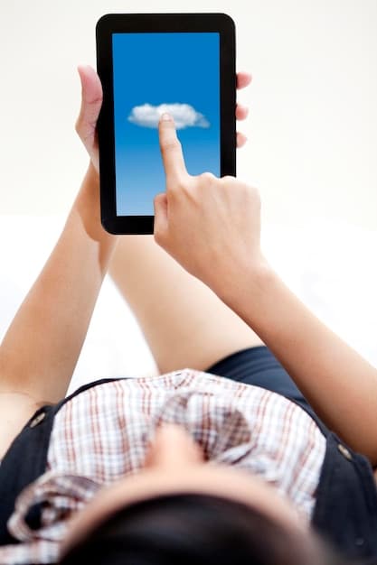 A close-up of a hand hovering over a smartphone screen displaying the Letterboxd app, with a subtle 