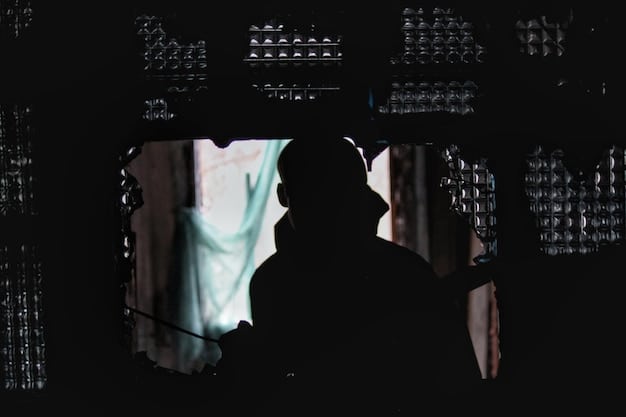 A shadowy figure, partly obscured by digital code, looking intently at multiple computer screens displaying complex algorithms and encrypted messages. The overall atmosphere is dark and high-tech.