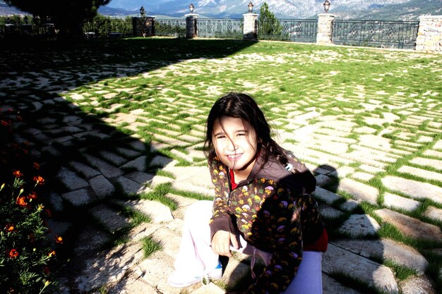A poignant scene from 'Pachinko' featuring the younger Sunja (Minha Kim) in Korea, highlighting the beauty of her homeland and the close-knit community she is forced to leave behind. This image represents the initial displacement and cultural grounding that informs Sunja's character development throughout the series, prompting viewers to consider, 'Is 'Pachinko' Season 2 Worth the Wait? A Deep Dive Review (Updated for 2025)'.