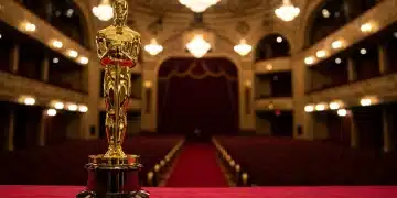 Golden Oscar statuette on red carpet, symbolizing Academy Awards anticipation.